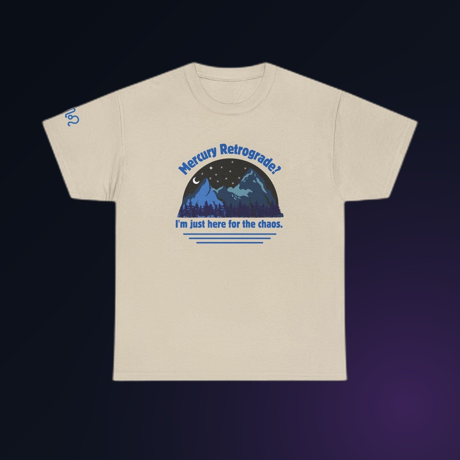 Sand Gildan 5000 unisex t-shirt with blue mountains, stars, and a crescent moon under the words 'Mercury Retrograde? I'm just here for the chaos' printed on the chest